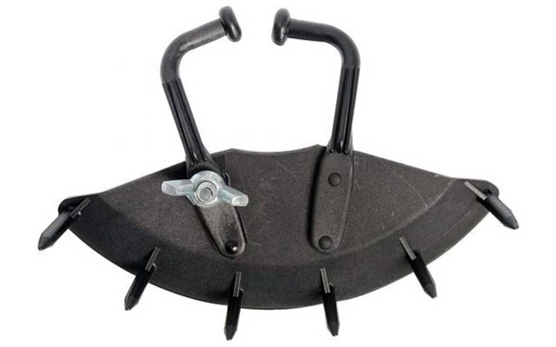 Fan-shaped device with metal spikes, used as a nasal weaning device.